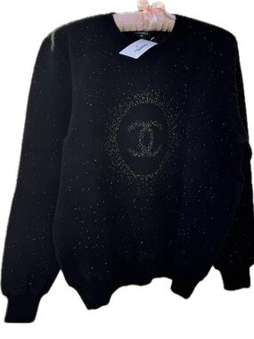 Authentic and New CHANEL Black Pullover CC Emblem with sprinkling golden details